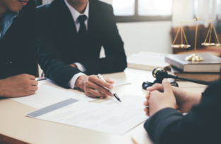 What does a corporate lawyer do and why are they important?