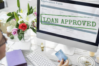 a computer screen showing personal loan approved form